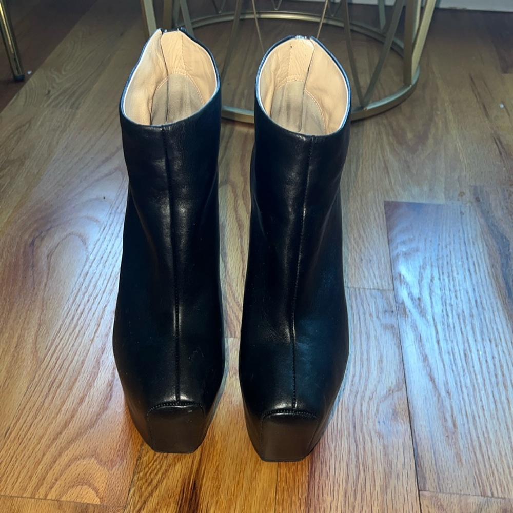 Black Giuseppe Zanotti platform bootie. Pre loved, gently worn.